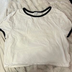 White crop top with black lining